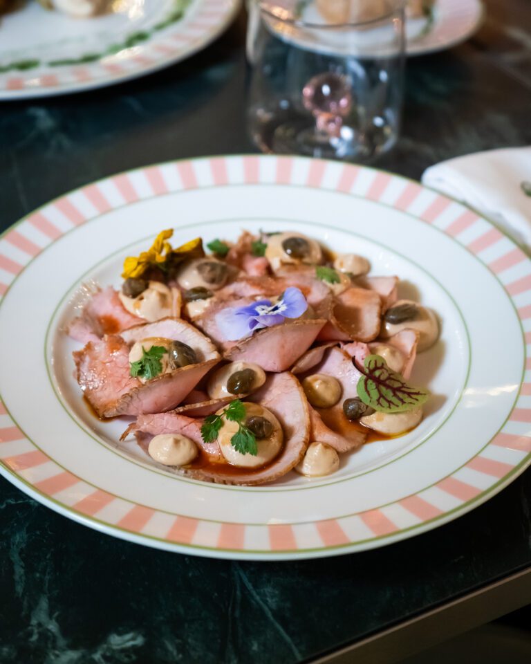 Seasonal dish and wine pairing on a terrace table